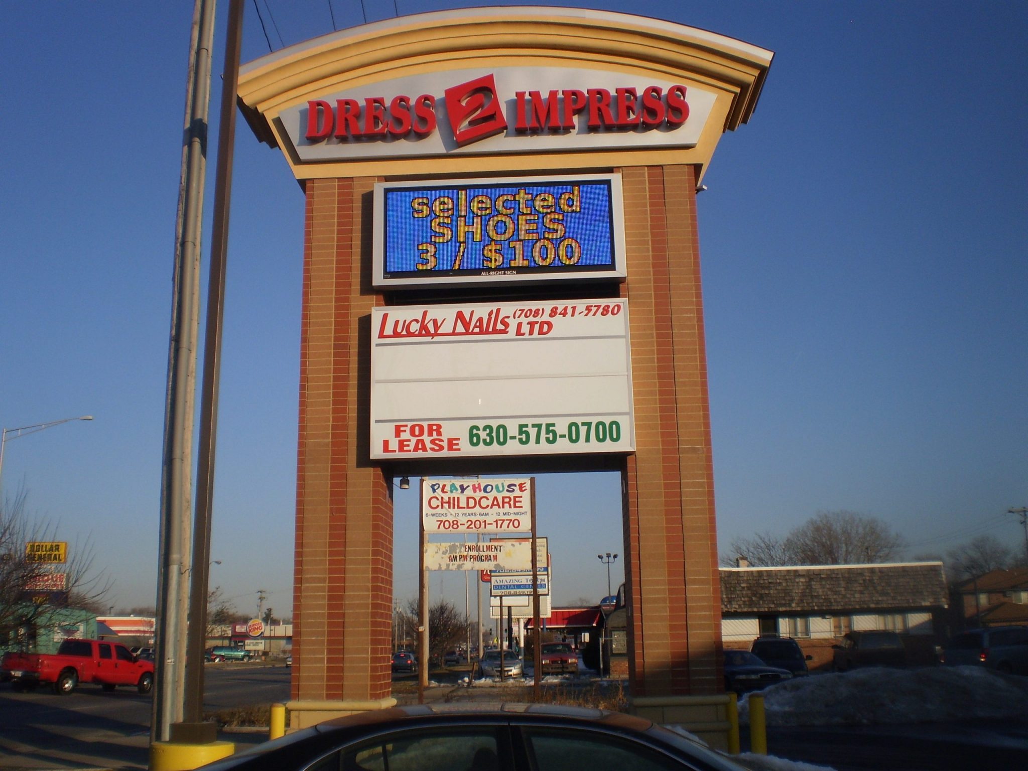 A large outdoor monument sign with a digital sign, representing how one can benefit from calling a sign installation company in Merrillville.