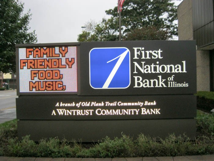 A monument sign outside of a bank, representing how one can benefit from calling a Tinley Park commercial sign company.