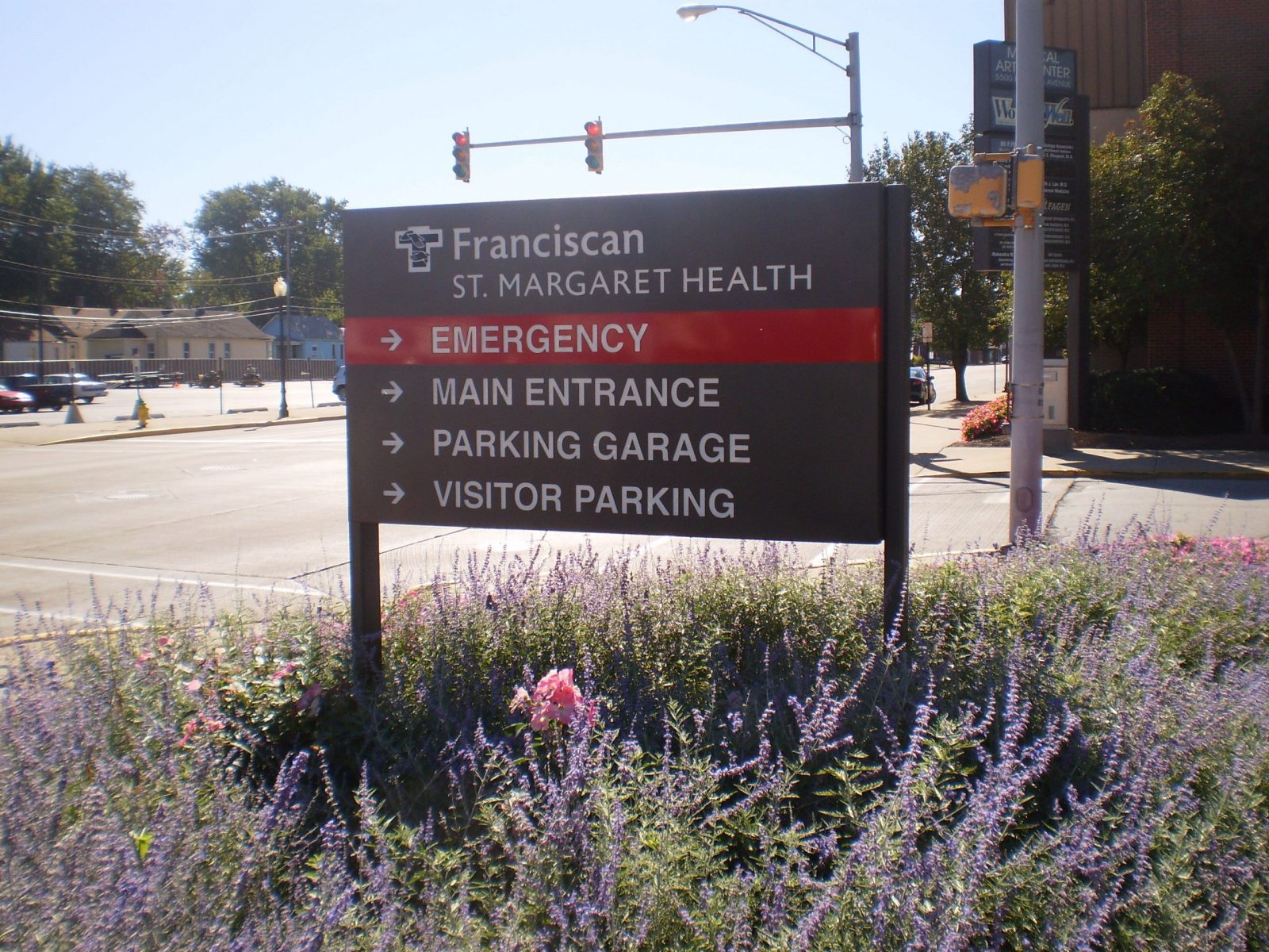 A panel sign with directions for drivers to find specific buildings, representing how one can benefit from calling Lake County, IL sign company.