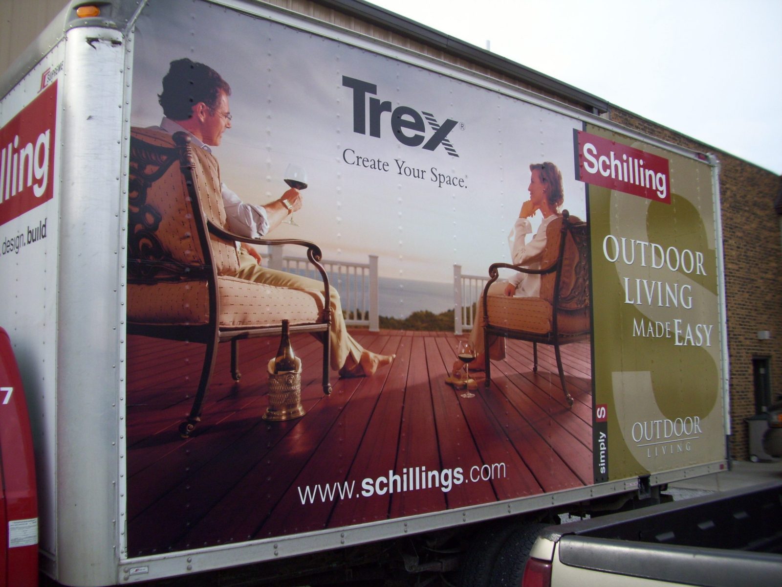The trailer of a truck displaying a big graphic fleet, representing how one can benefit from calling a Chicago commercial truck lettering company.