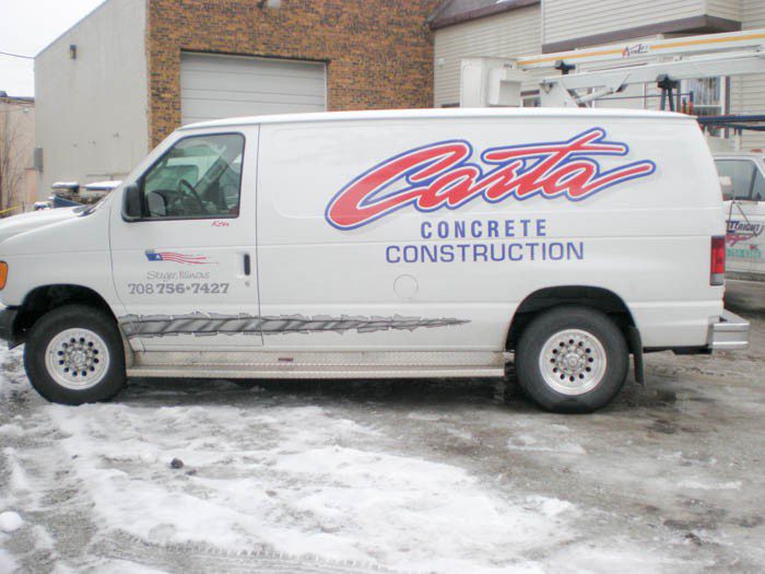 A white van with large graphic fleet, representing how one can benefit from calling a Chicago commercial truck lettering company.