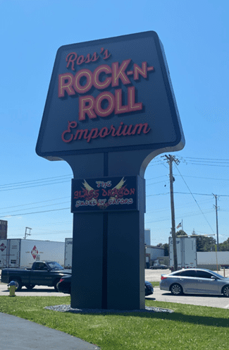 A service sign for Orland Park's rock n roll emporium.
