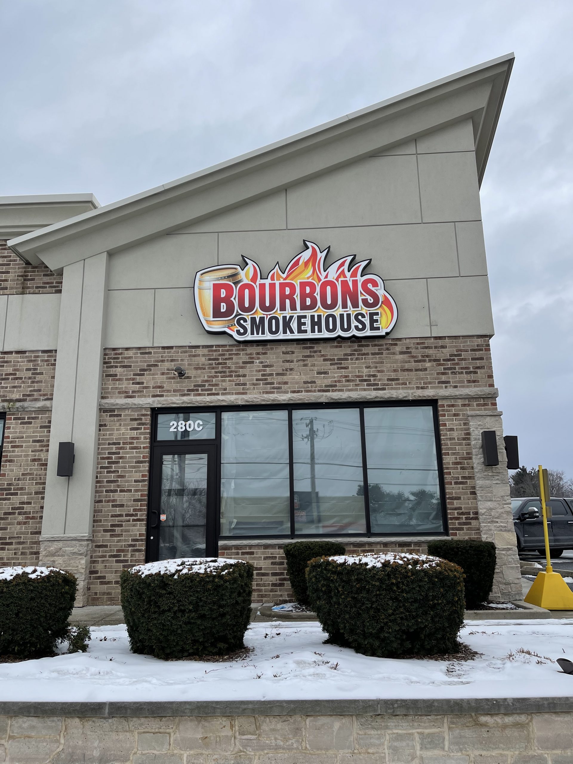 Bourbons Smokehouse Joliet Hanging Business Signs.